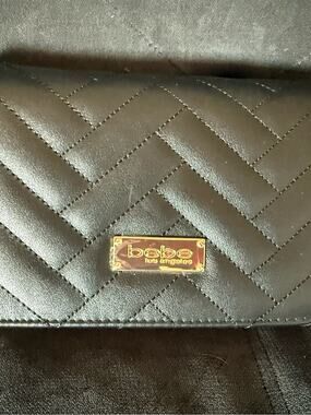 bebe Black Quilted Leather purse with Gold Chain Accent